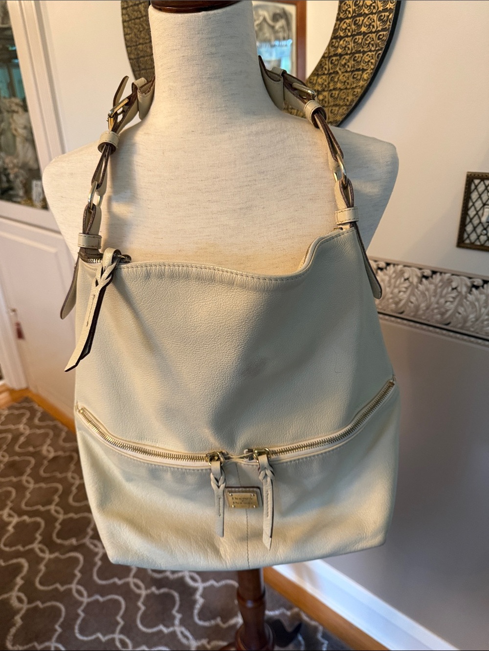 Dooney and Bourke like new cream leather shoulder hobo with gold hardware